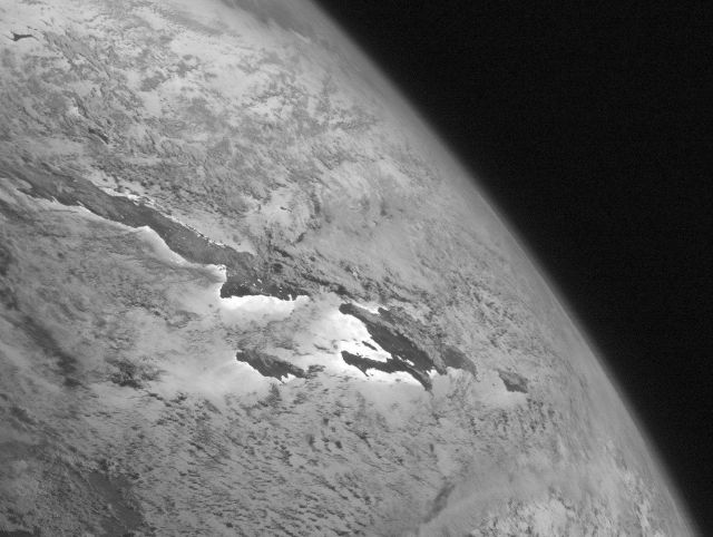 Cuba, Hispaniola, and Jamaica illuminated by sunlight as seen at the far eastern extent of GOES-West's visible coverage Picture