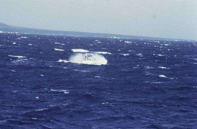 Survey launch off NOAA Ship RAINIER in heavy seas off Big Island of Hawaii. Picture