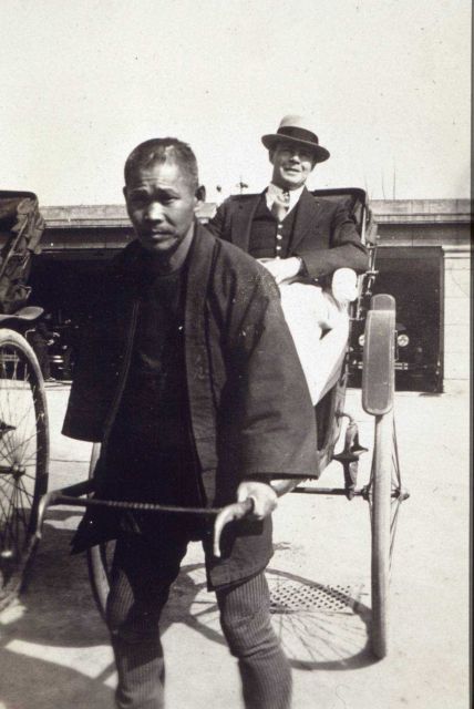 Traveling by human power - rickshaw ride in the Orient Picture