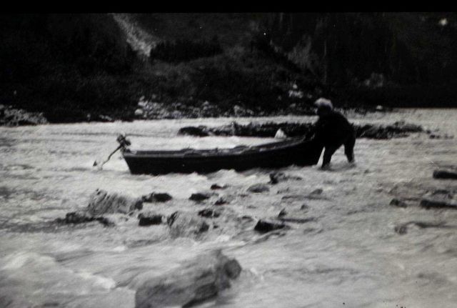 Hauling skiff up the rapids Picture