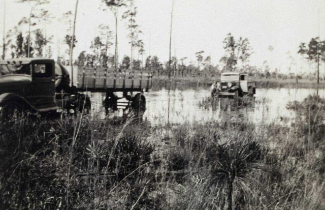 Steel truck towing building truck after motor drowned Picture