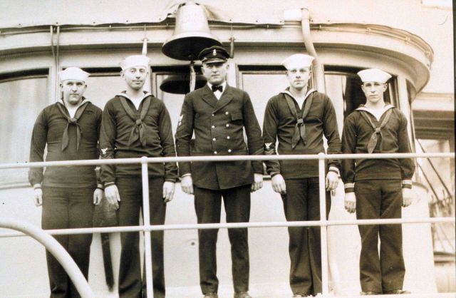 Appears to be the chief boatswain and deckies on the Coast and Geodetic Survey Ship SURVEYOR. Picture