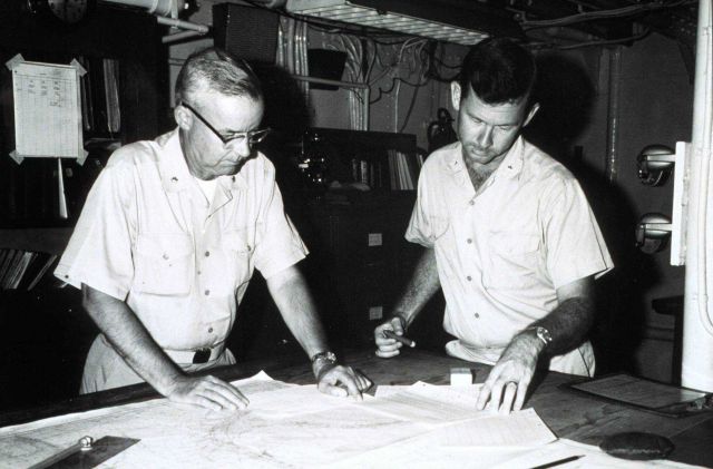 Commander Harry Reed on left, commanding officer of HYDROGRAPHER; Lieutenant Commander Kelly Taggart on right, field operations officer. Picture