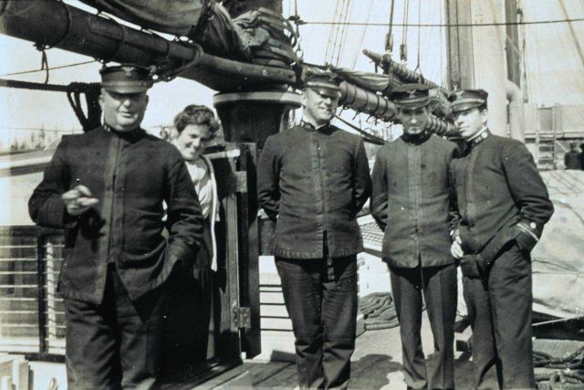 Three unidentified officers and Leo Otis Colbert on left Picture