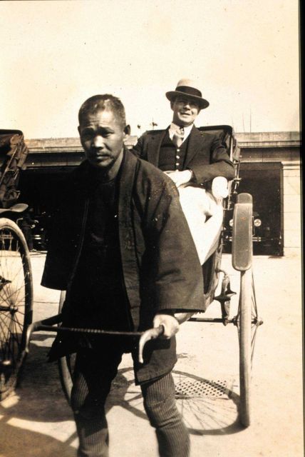 Robert Earle in a rickshaw at a stop at Shanghai while in transit to the Philippines. Picture