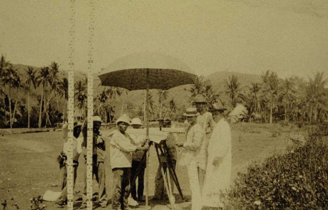 Filipino padre watching topographic work Picture