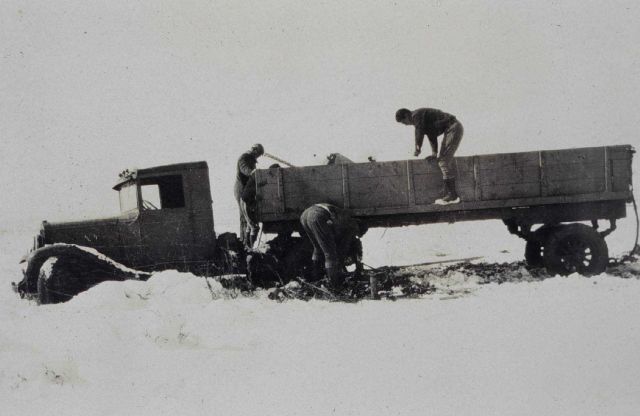 Steel tower truck stuck in the mud and snow Picture