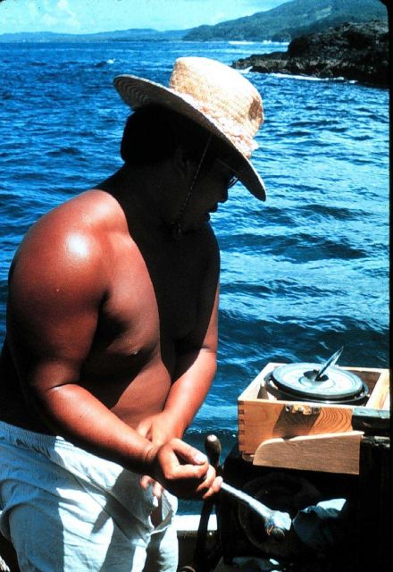 Coxswain Tosh Kaiura checking compass while getting on line Picture