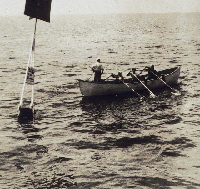 Planting a survey signal buoy Picture