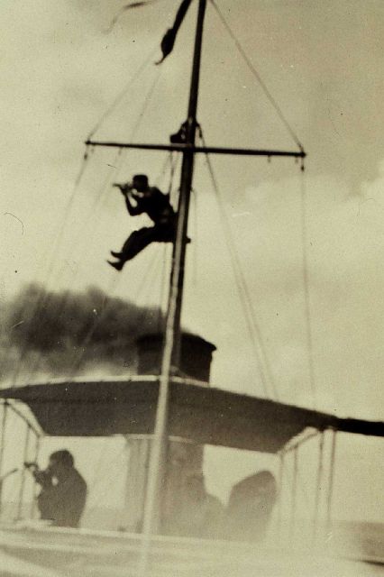 Taking sextant angles for positioning vessel. Picture