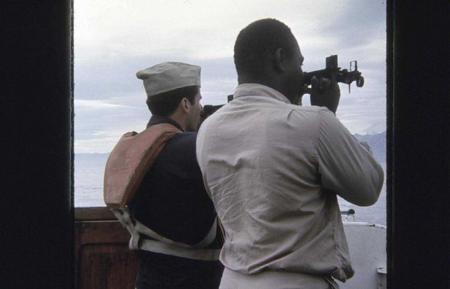Wharton and Jeffries taking three-point sextant fix Picture