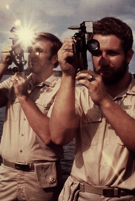Checking index error of sextants prior to conducting launch hydrography. Picture