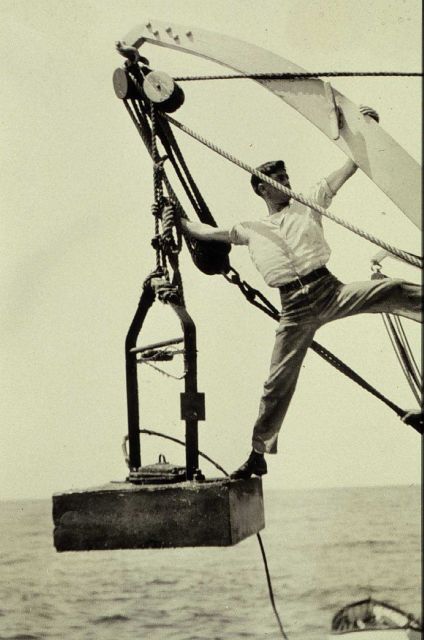 Planting a hydrophone anchor with the cable attached Picture