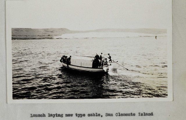 Launch laying the cable from hydrophone to the shore station Picture