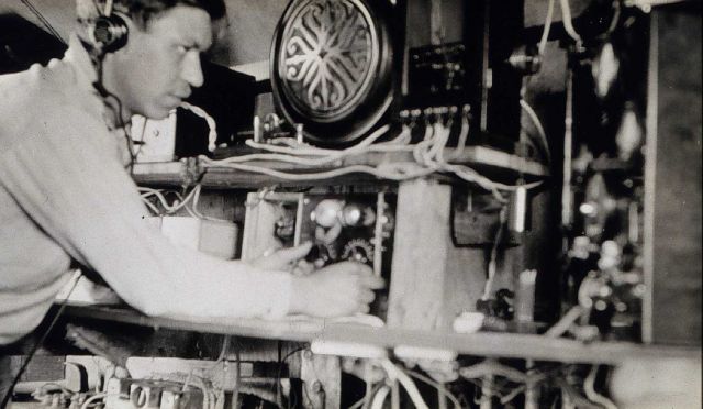 Radio operator at work at Radio Acoustic Ranging shore station KGHS Picture