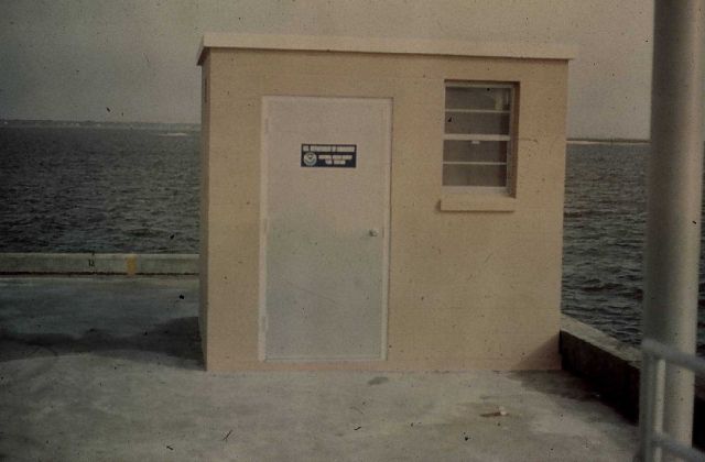 Tide gauge house on pier along southeast Atlantic coast Picture