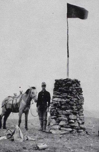 Rock cairn signal at divide between two main forks of the Ladue River Picture