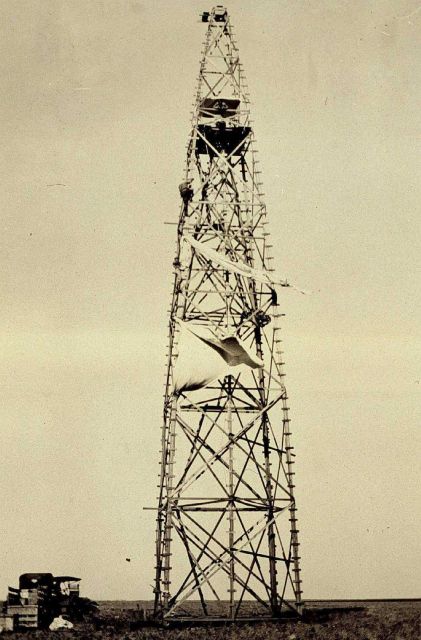 Removing wind tarps at Station Umbarger Picture