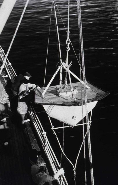 Current meter buoy being lowered to the rail Picture