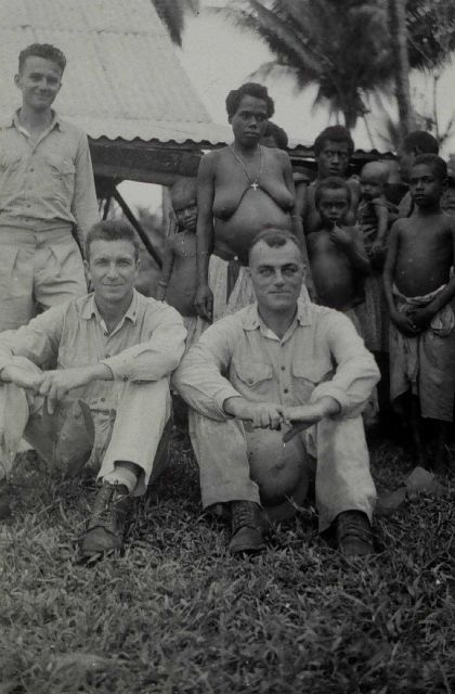 Marine survey and mapping officers with natives Picture