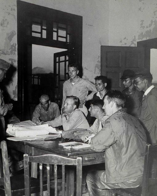Norman Porter at Sasebo, Japan, with port authorities Picture