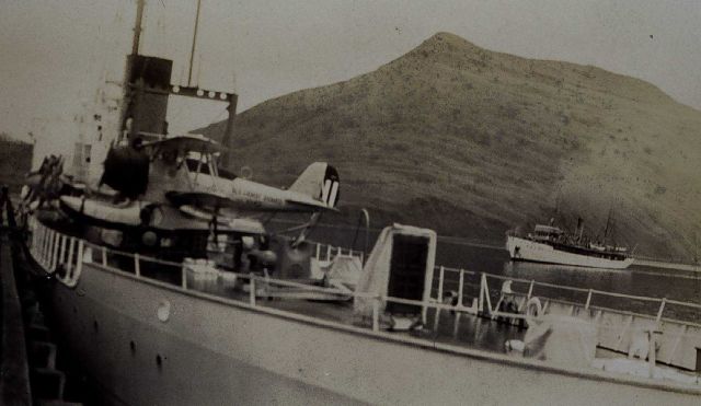 Coast and Geodetic Survey Ship SURVEYOR as seen over the stern of a Navy cruiser Picture