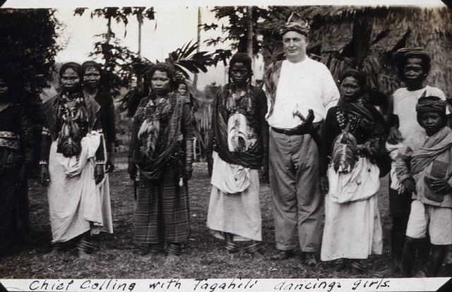 Chief Collins with Tagahili dancing girls. Picture