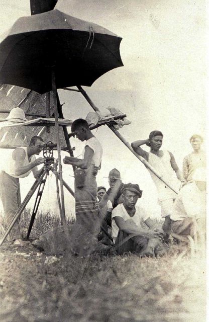 Ken Crosby observing with his shore party standing by Picture