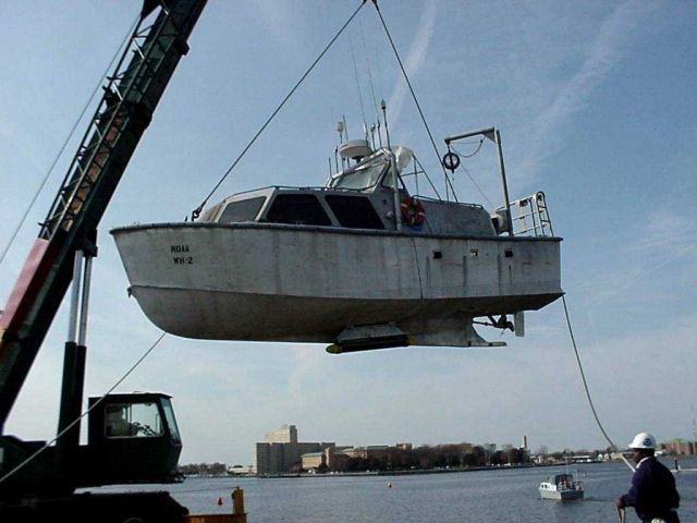 NOAA Launch Whiting-2 showing bottom-mounted sidescan sonar system. Picture