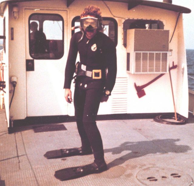 Diver preparing to check source of shoal spot in sounding record. Picture