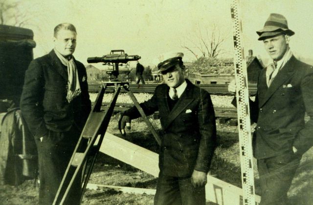 Bill Chisom, rodman; George Hastings, the observer and party chief; and Bill Unger rodman Picture