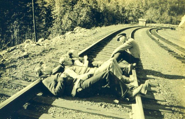 Level crew tempting fate along a railroad northeast of Decatur. Picture