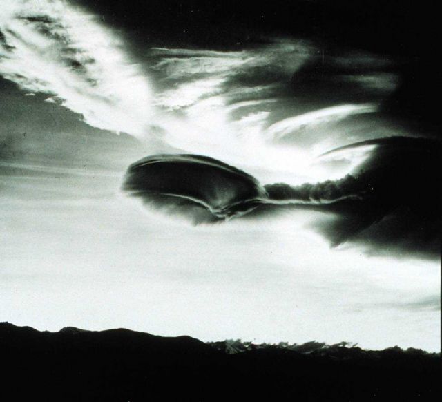 Cumulus Lenticularis - a remarkable roll cloud over the Sierras Formed by the Sierra Wave north of Independence, California Strong updrafts associated Picture