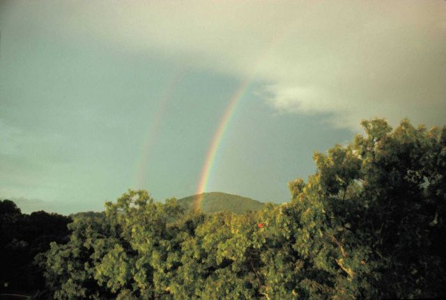 A primary and secondary rainbow - note reversal of spectrum Reversal caused by second bow being produced by 2 internal reflections Picture
