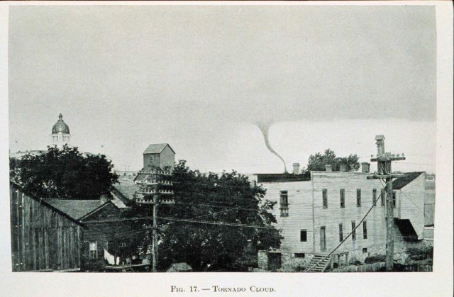 Tornado cloud as seen over the buildings of an American city In: 
