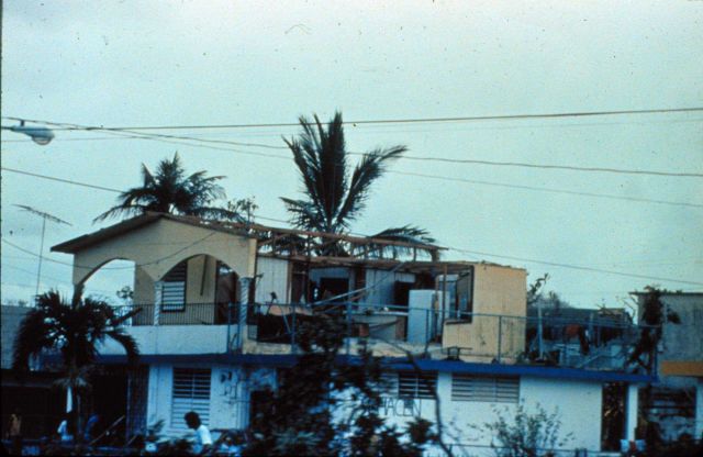 Damage to conventional housing at Luquillo Notice second floor wall blown in Hurricane Hugo Picture
