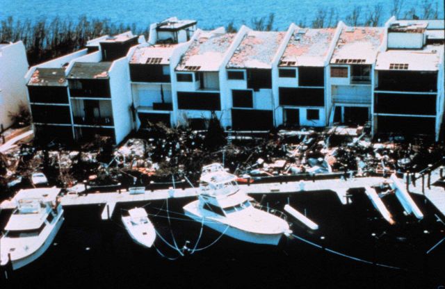 Hurricane Andrew - Kings Bay townhomes - $750K each Double whammy from Andrew - upper windows blown out by winds before eye Debris in foreground resul Picture