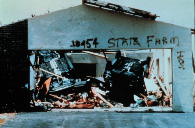 Hurricane Andrew - Two vehicles remain in garage but overturned by force of wind Picture