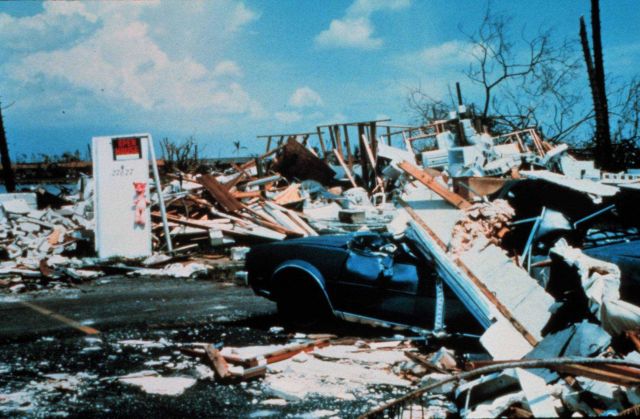 Hurricane Andrew - Concrete tie beam deposited on a car Picture