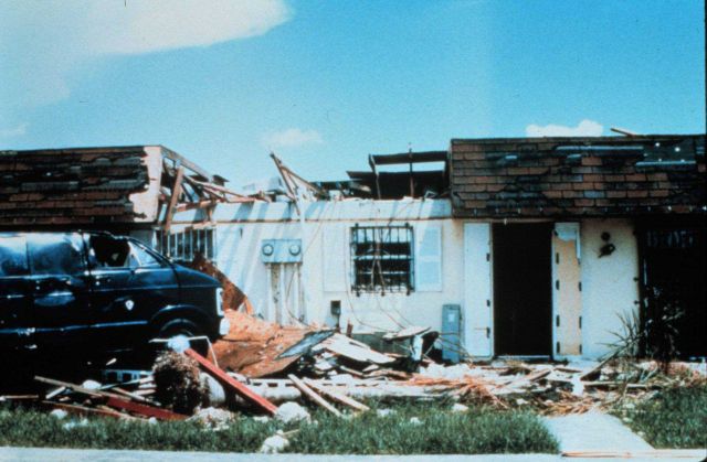 Hurricane Andrew - Front view of a home in which a fatality occurred A concrete tie beam from another unit crashed through the roof of this home Picture