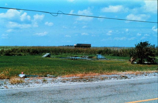 Hurricane Andrew - Home pushed off of foundation and well back into marsh This was several miles north of Cocodrie Damage caused by storm surge and wi Picture