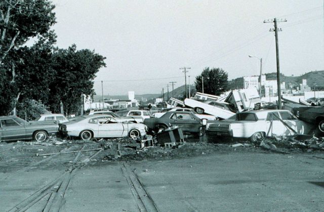 A heap of cars carried downstream by the force of a great flash flood Picture