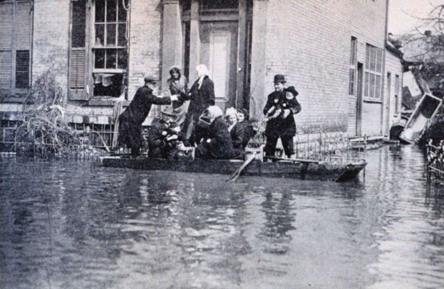 Improvised row boats built by National Cash Register Company were of great value in rescuing marooned residents of Dayton Picture