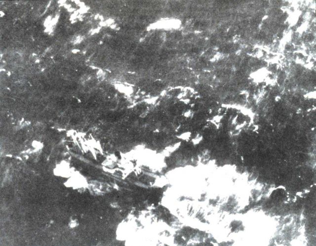 Merchant vessel caught in the trough of heavy seas prior to sinking Picture