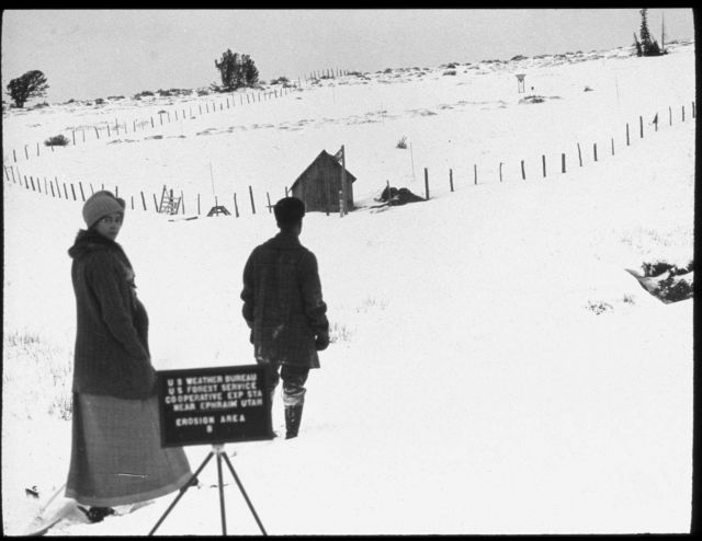 Weather Bureau observer and wife on snowshoes approaching the Weather Bureau/ Forest Service cooperative site outside of Ephriam, Utah, for snow obser Picture