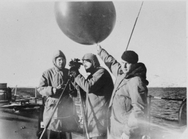 Launching and preparing to track a pilot balloon from a Coast Guard vessel Picture
