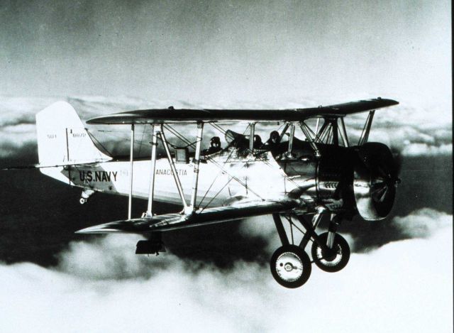 Navy bi-plane with meteorograph on starboard wing strut Taking meteorological measurements for pressure, temperature, and humidity Manned flights were Picture