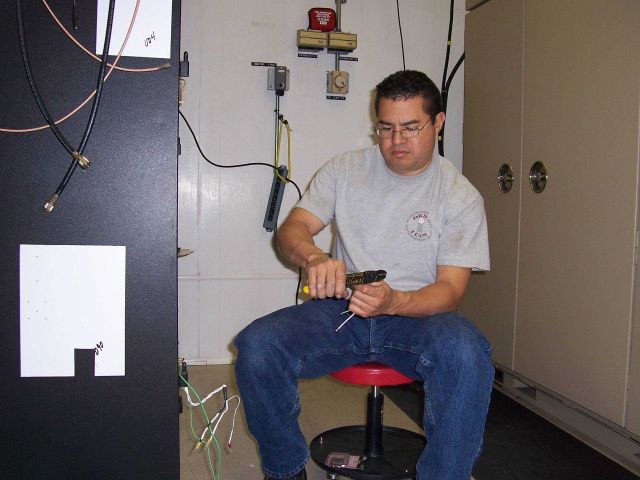 Ray Gonzalez, RS Information Systems Lead Technician working on the Open Radar Data Acquisition (ORDA) upgrade at Western Arkansas NWS radar site. Picture
