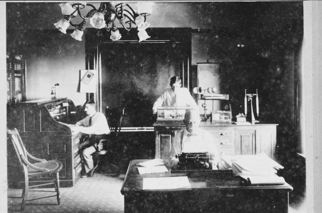 At work in an unidentified Weather Bureau office. Picture