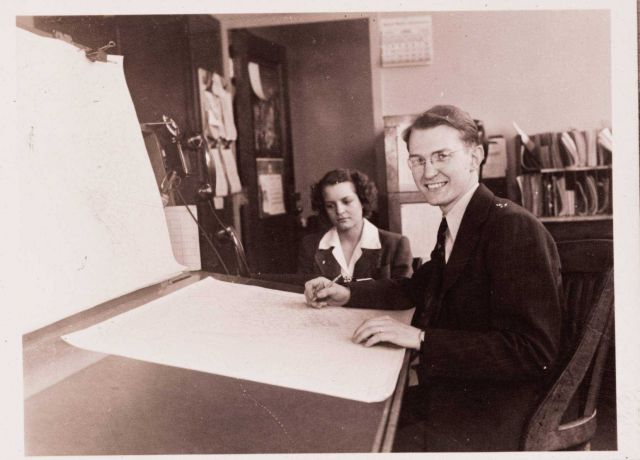 Unidentified personnel happy with the results of the day's weather map Picture
